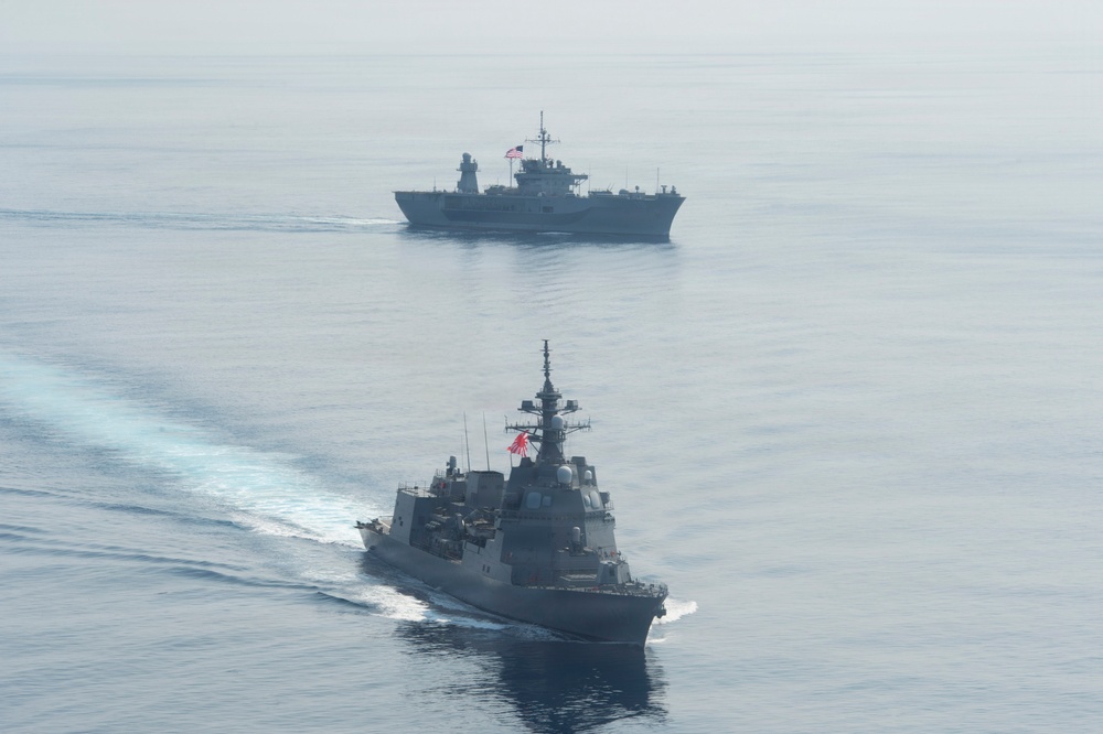 USS Blue Ridge (LCC 19) Steams Alongside Japan