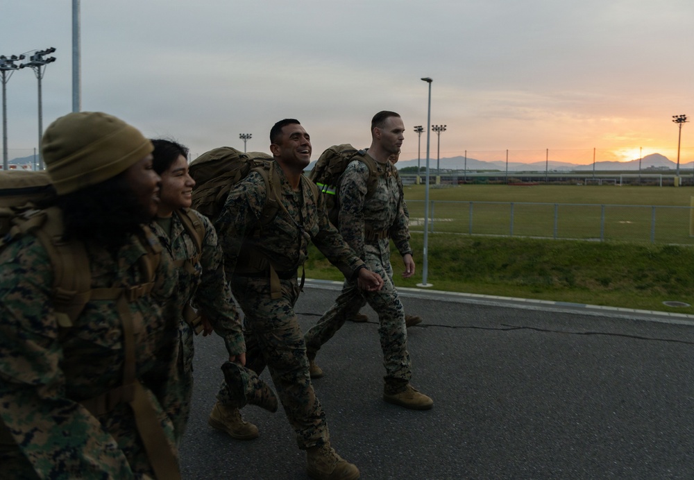 MAG-12 Marines ruck during sunrise