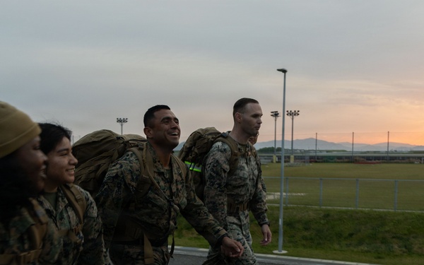 MAG-12 Marines ruck during sunrise