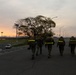 MAG-12 Marines ruck during sunrise