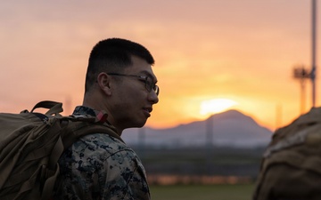 MAG-12 Marines ruck during sunrise