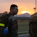 MAG-12 Marines ruck during sunrise