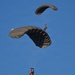 Military Freefall Students Jump Combat Equipment During Training