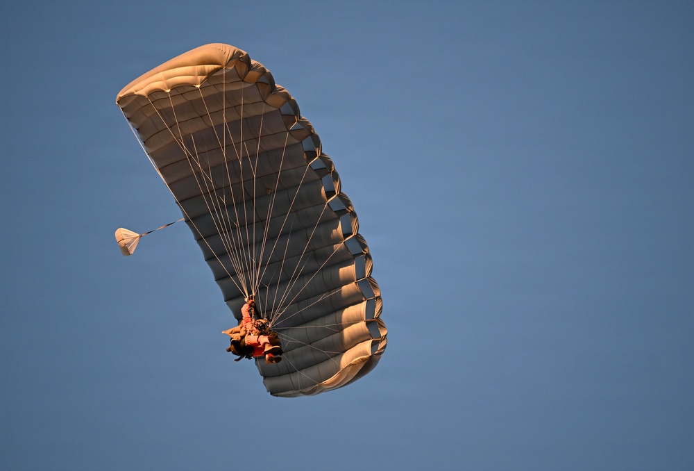 Military Freefall Students Jump Combat Equipment During Training