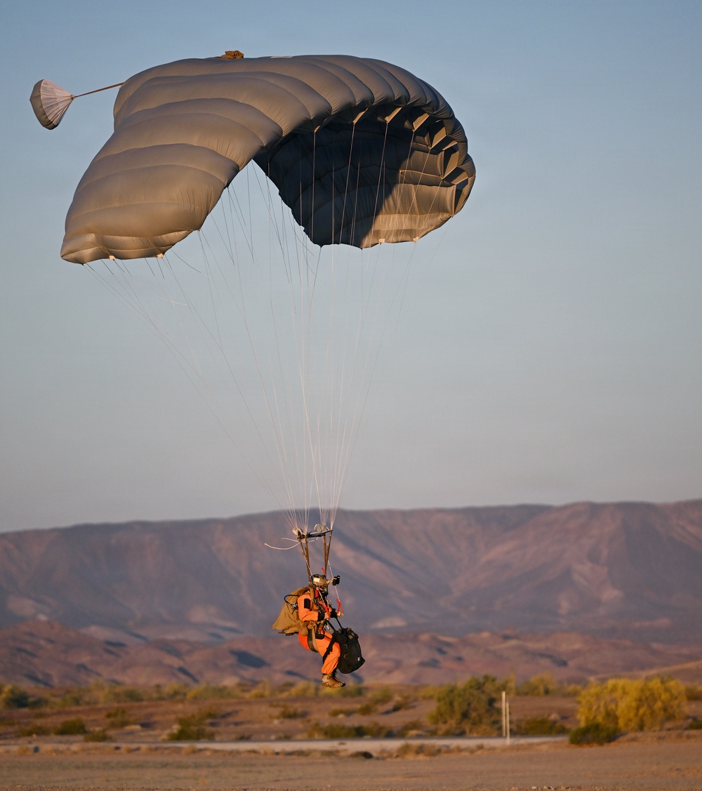 Military Freefall Students Jump Combat Equipment During Training