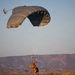 Military Freefall Students Jump Combat Equipment During Training