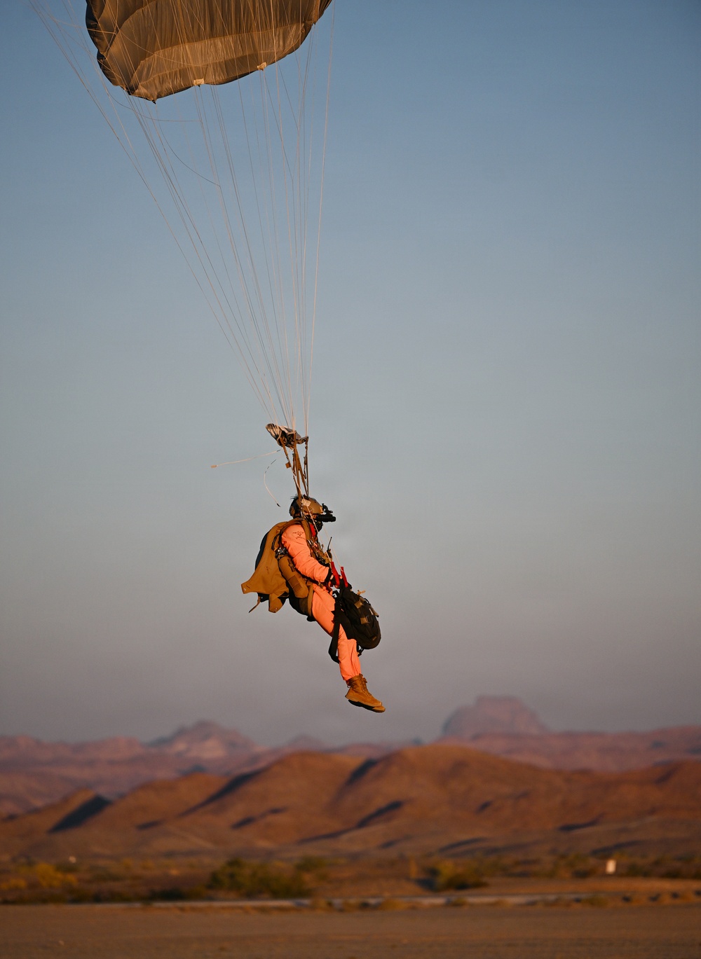 Military Freefall Students Jump Combat Equipment During Training