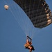 Military Freefall Students Jump Combat Equipment During Training