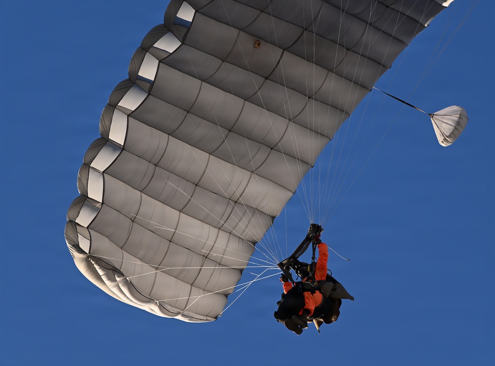 Military Freefall Students Jump Combat Equipment During Training