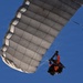 Military Freefall Students Jump Combat Equipment During Training