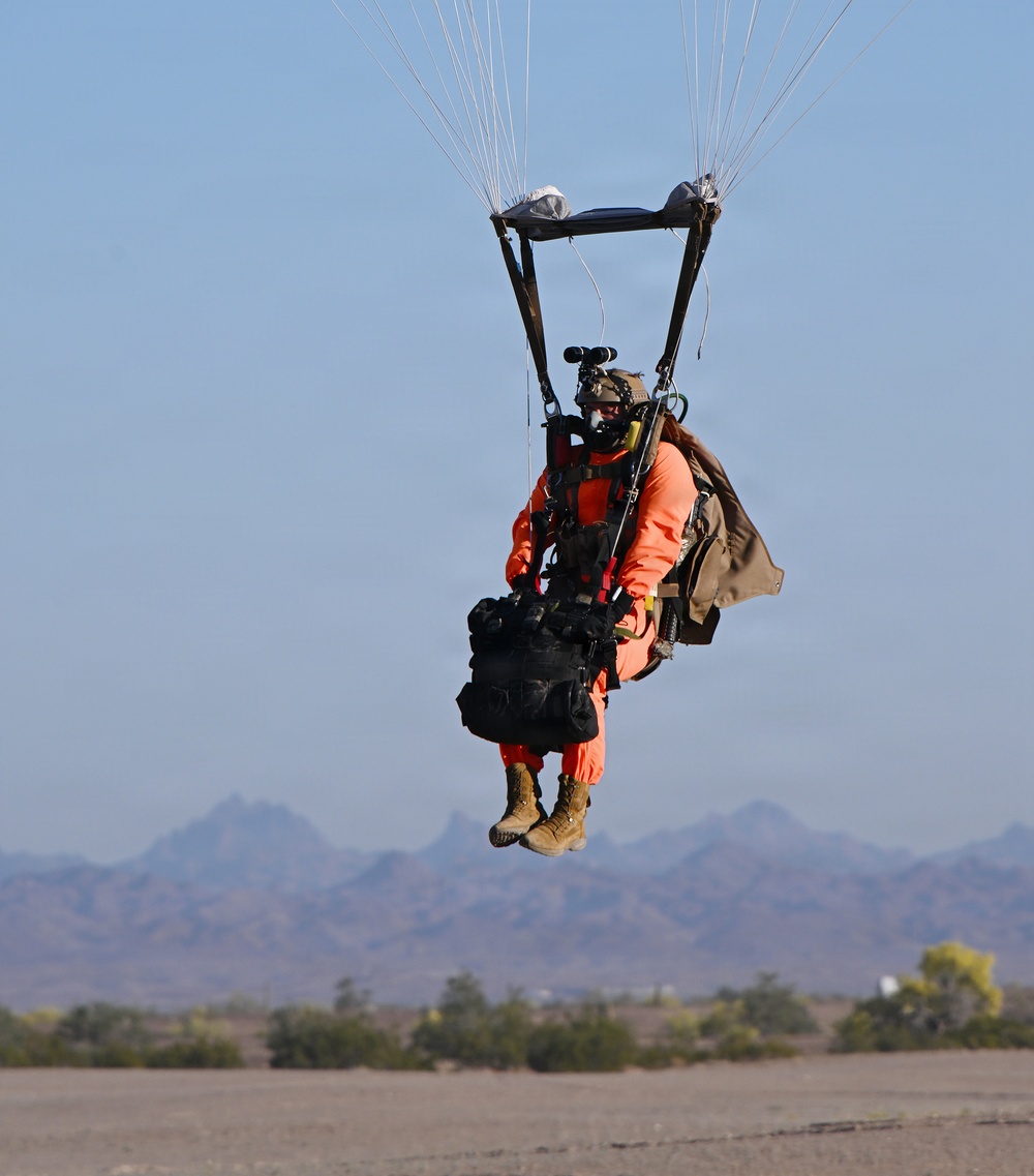 Military Freefall Students Jump Combat Equipment During Training