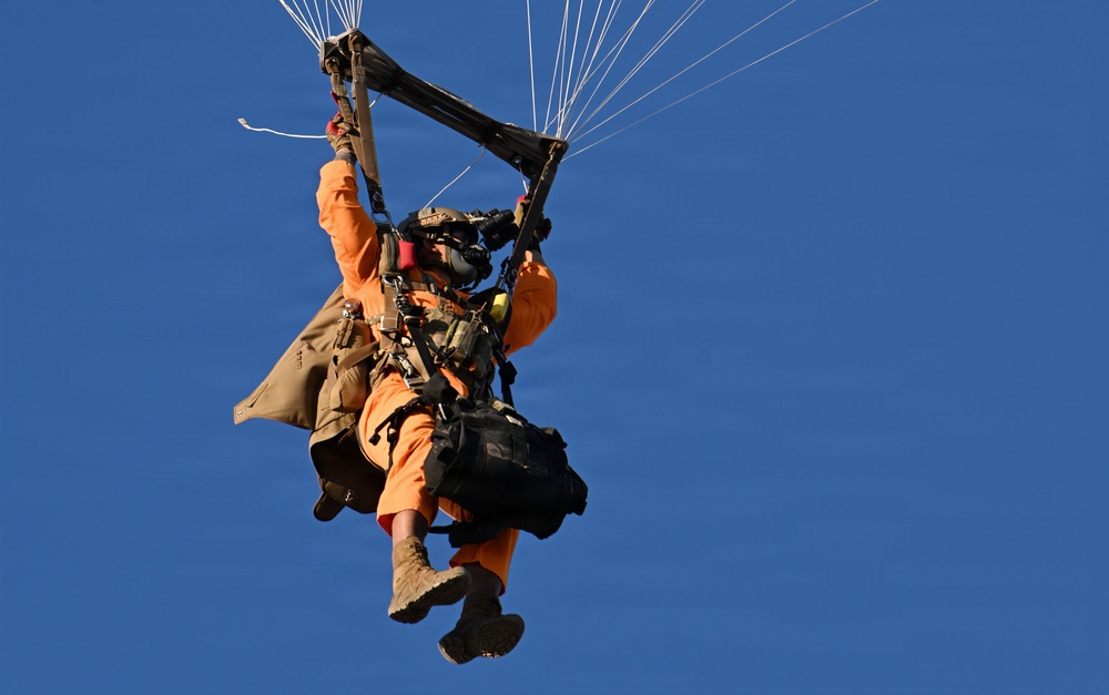 Military Freefall Students Jump Combat Equipment During Training