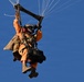 Military Freefall Students Jump Combat Equipment During Training