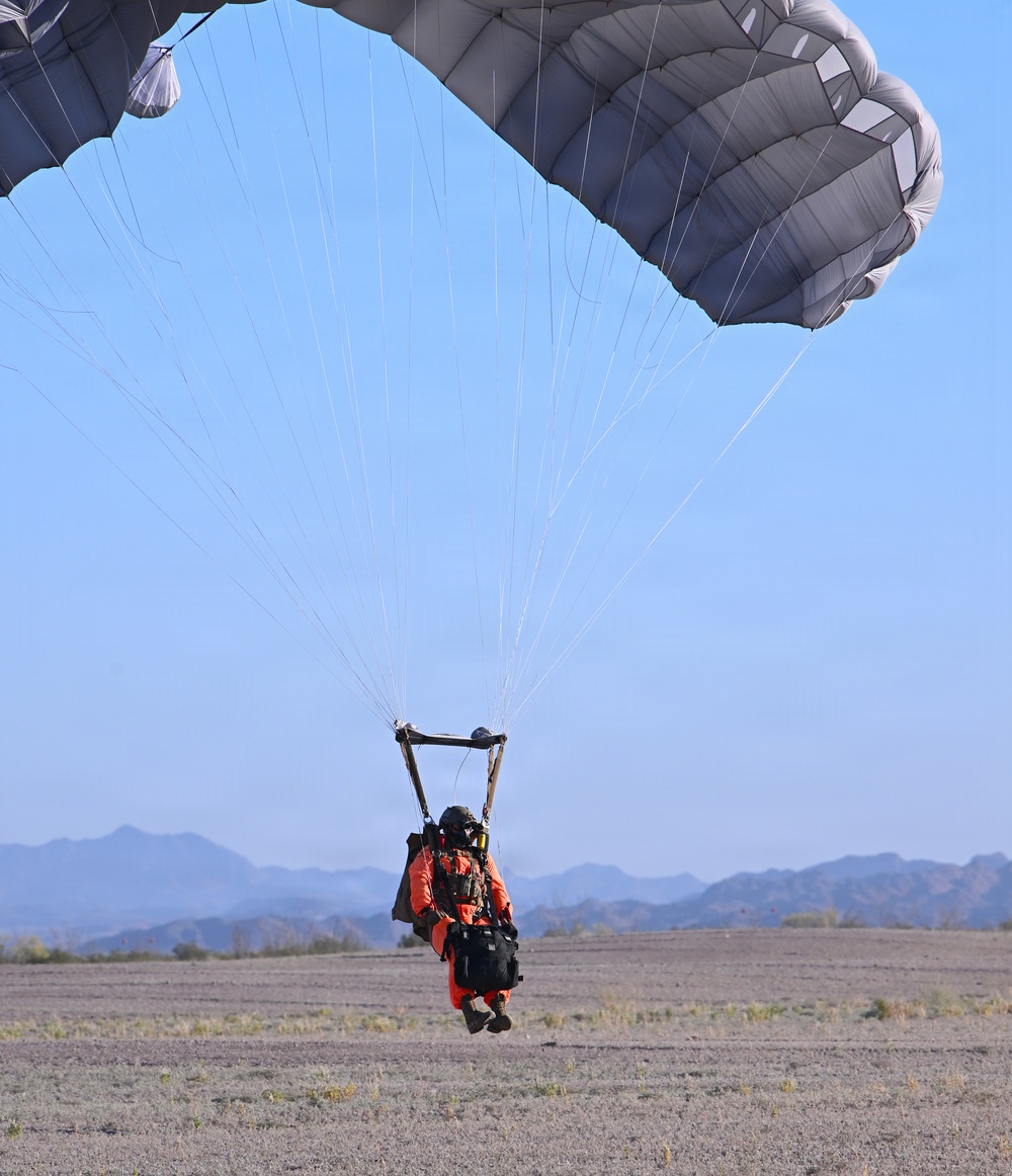 Military Freefall Students Jump Combat Equipment During Training