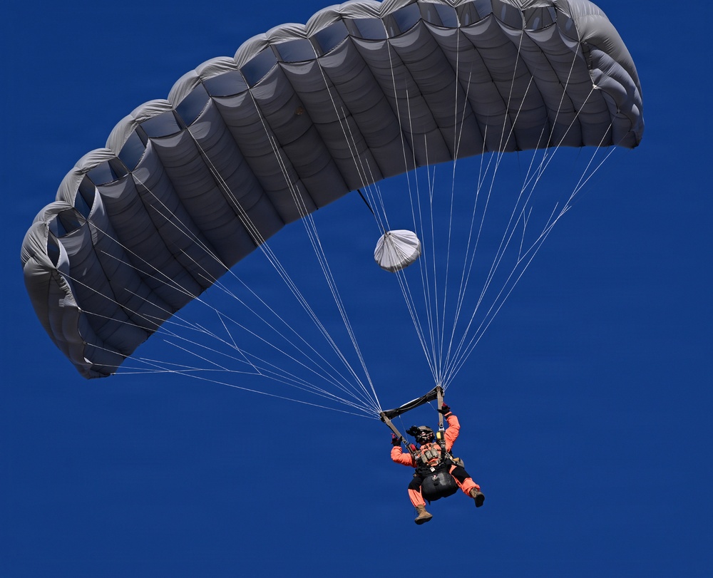 Military Freefall Students Jump Combat Equipment During Training