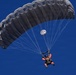 Military Freefall Students Jump Combat Equipment During Training