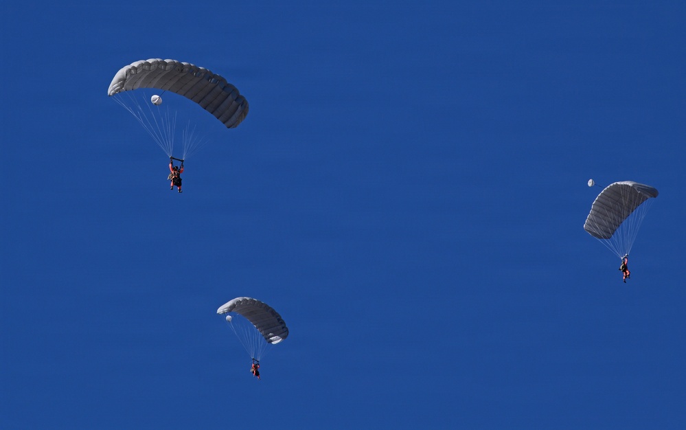Military Freefall Students Jump Combat Equipment During Training