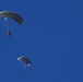 Military Freefall Students Jump Combat Equipment During Training