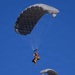 Military Freefall Students Jump Combat Equipment During Training