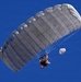 Military Freefall Students Jump Combat Equipment During Training