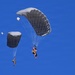 Military Freefall Students Jump Combat Equipment During Training