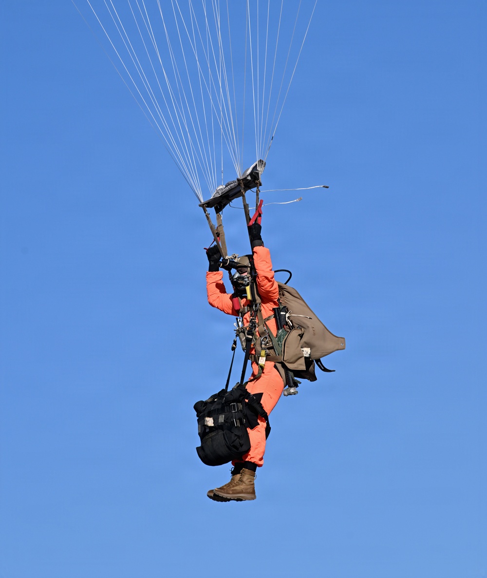 Military Freefall Students Jump Combat Equipment During Training
