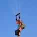 Military Freefall Students Jump Combat Equipment During Training
