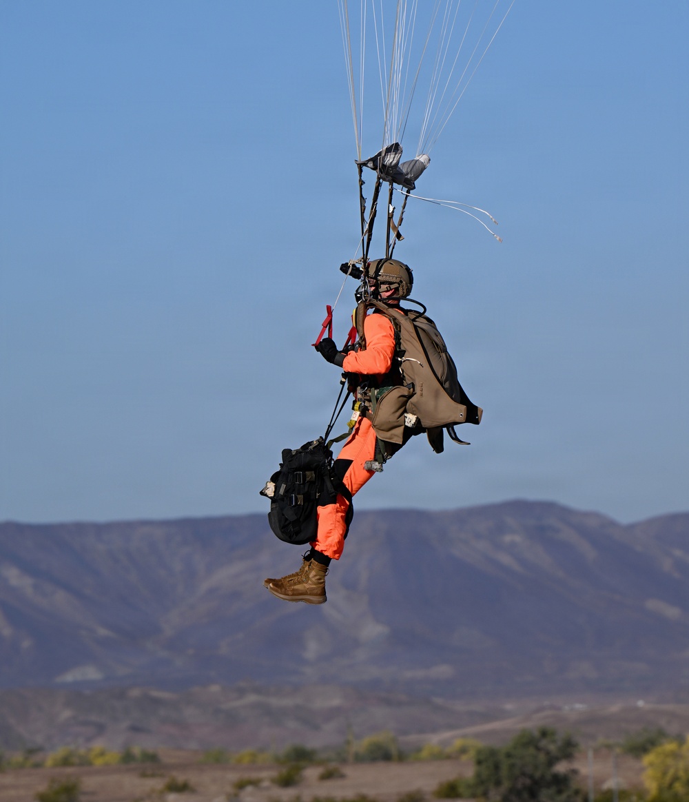 Military Freefall Students Jump Combat Equipment During Training