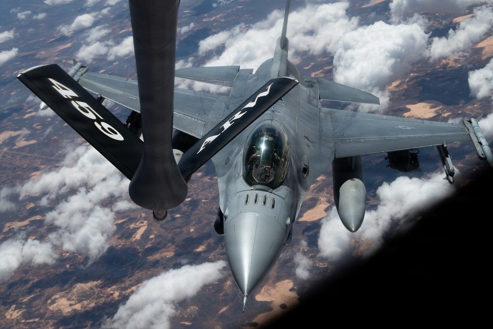 F-16s receive fuel from KC-135 in the U.S. Central Command AOR