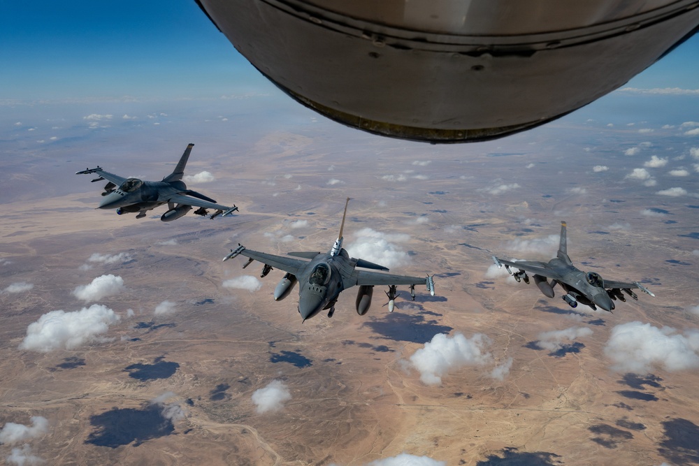 F-16s receive fuel from KC-135 in the U.S. Central Command AOR