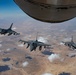 F-16s receive fuel from KC-135 in the U.S. Central Command AOR