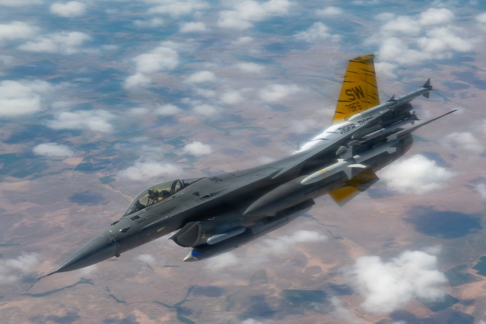 F-16s receive fuel from KC-135 in the U.S. Central Command AOR