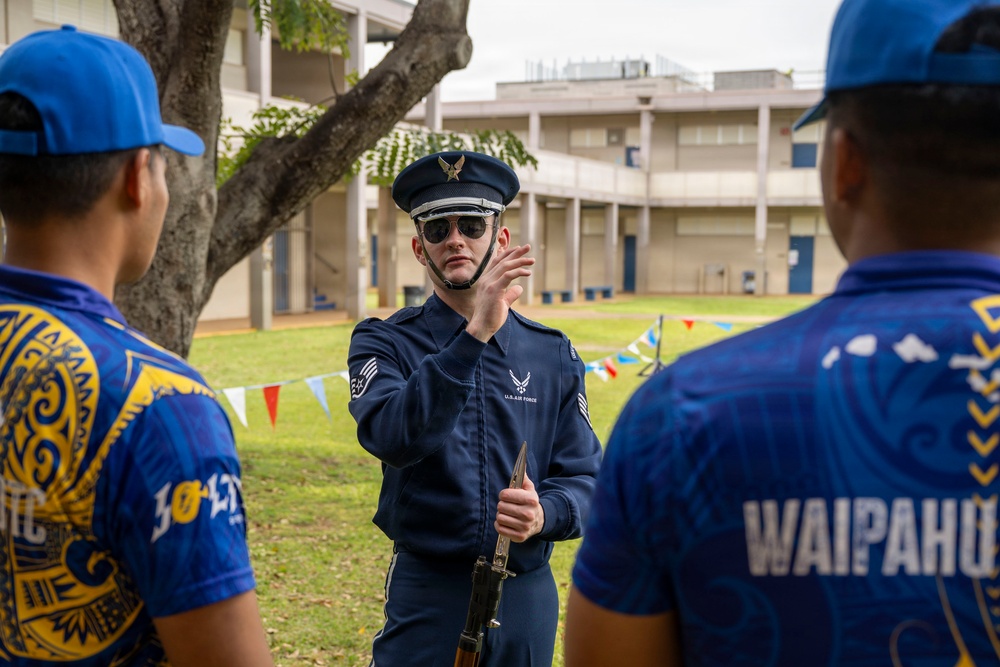 Drill Team performs for Waipahu, Aiea high schools
