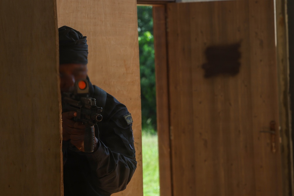 Multinational special operations forces conduct room-clearing exercise at Flintlock 26