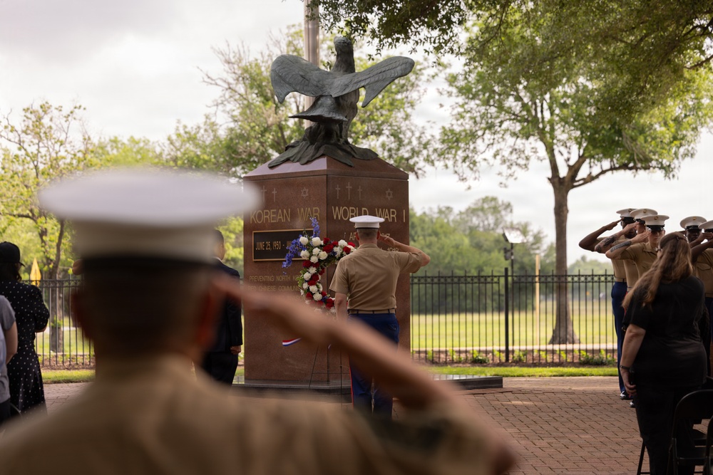 U.S. service members participate in wreath-laying ceremony at Bear Creek Park
