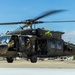 JTF-SB Army Soldiers execute UH-60 Black Hawk pre-flight checks