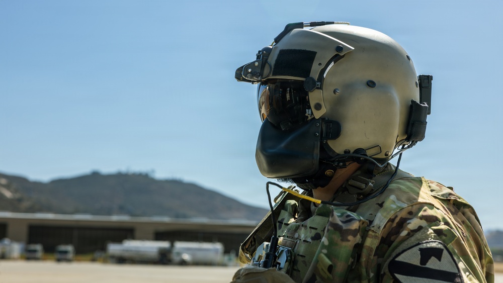 JTF-SB Army Soldiers execute UH-60 Black Hawk pre-flight checks