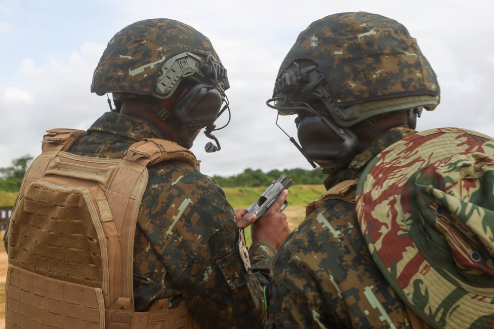 Multinational special operations forces execute rifle and pistol marksmanship drills during Flintlock 26