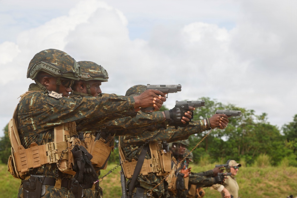 Multinational special operations forces execute rifle and pistol marksmanship drills during Flintlock 26