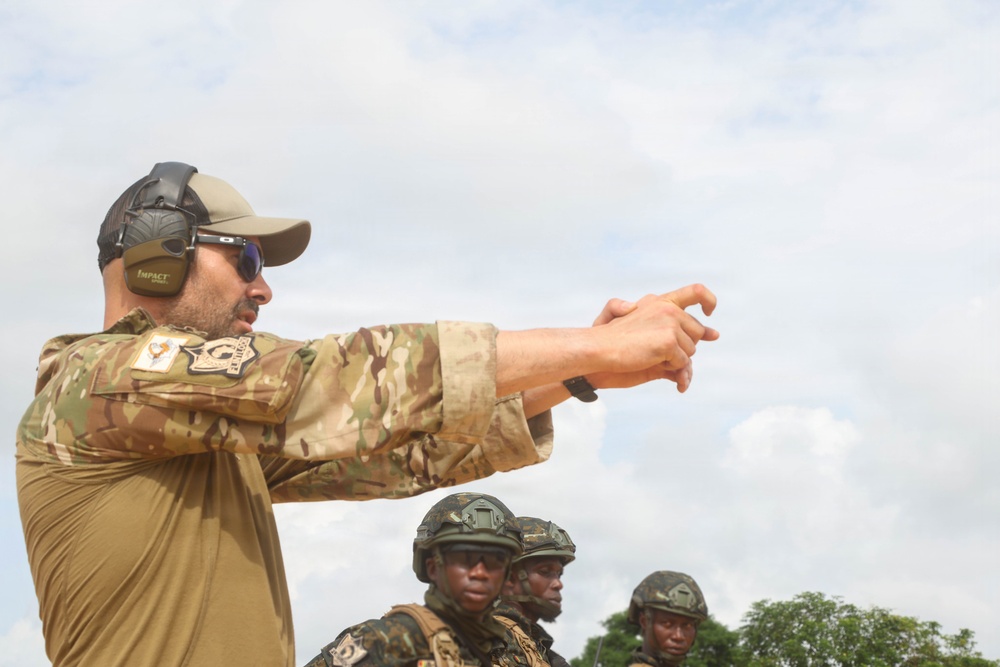 Multinational special operations forces execute rifle and pistol marksmanship drills during Flintlock 26