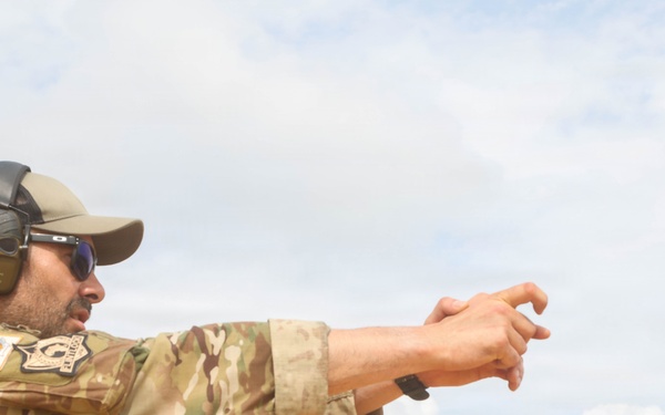 Multinational special operations forces execute rifle and pistol marksmanship drills during Flintlock 26