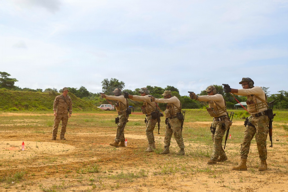 Multinational special operations forces execute rifle and pistol marksmanship drills during Flintlock 26