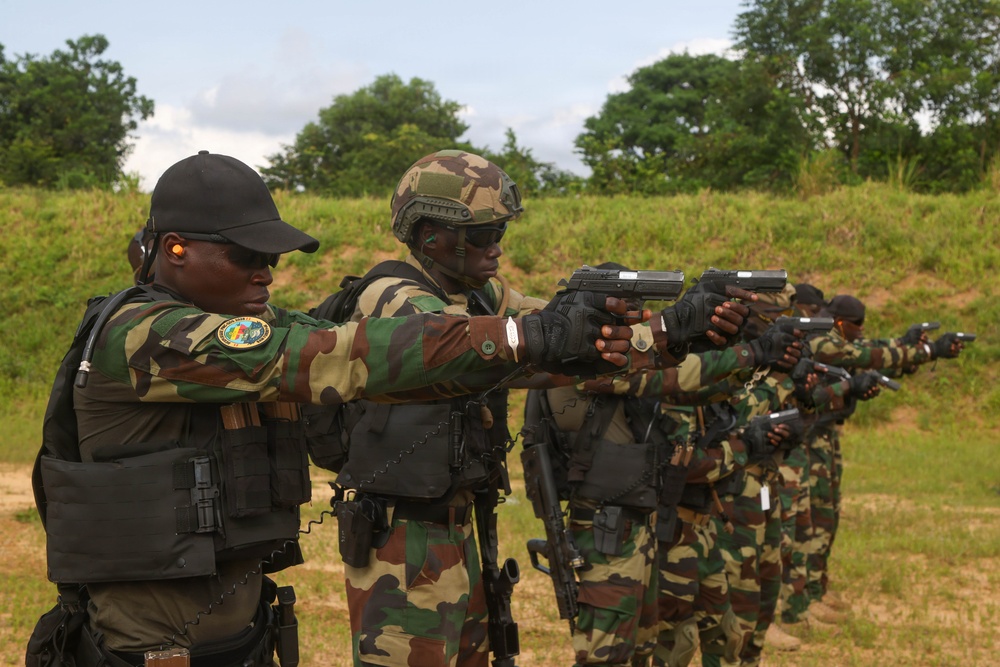 Multinational special operations forces execute rifle and pistol marksmanship drills during Flintlock 26