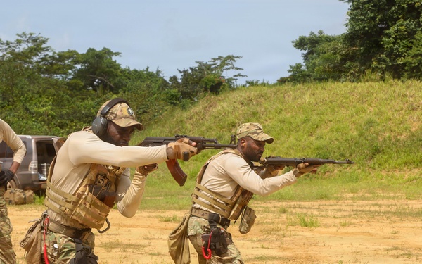 Multinational special operations forces execute rifle and pistol marksmanship drills during Flintlock 26
