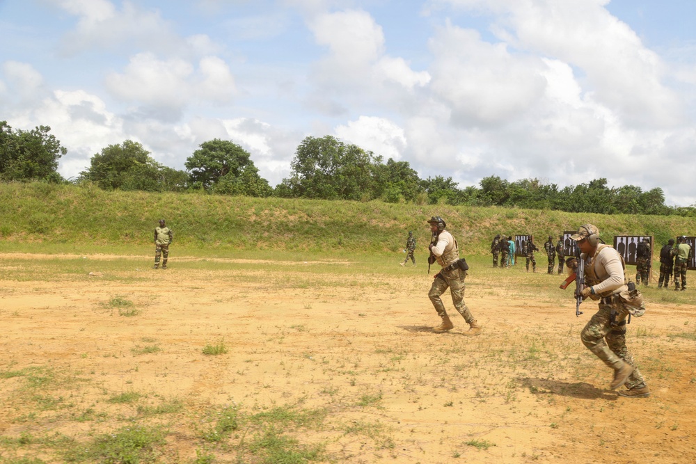 Multinational special operations forces execute rifle and pistol marksmanship drills during Flintlock 26