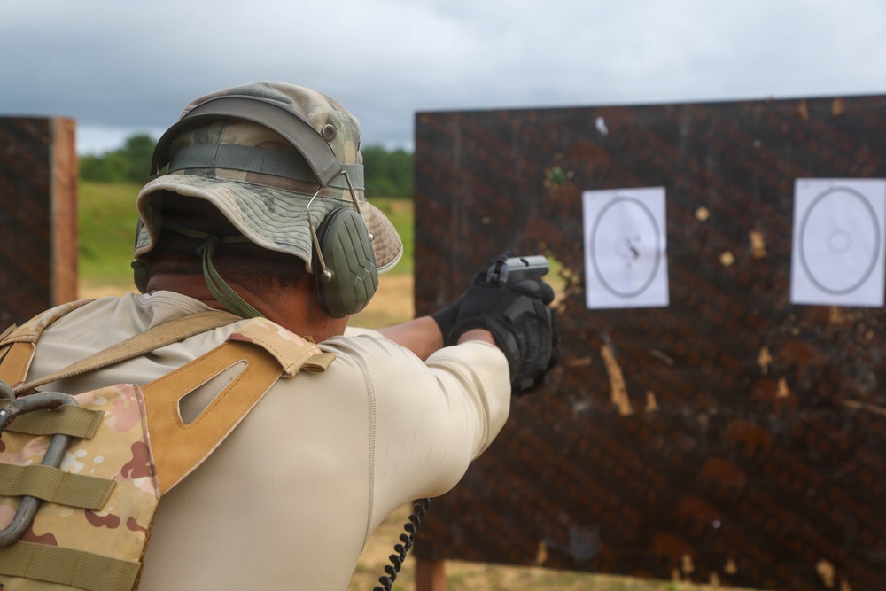 Multinational special operations forces execute rifle and pistol marksmanship drills during Flintlock 26