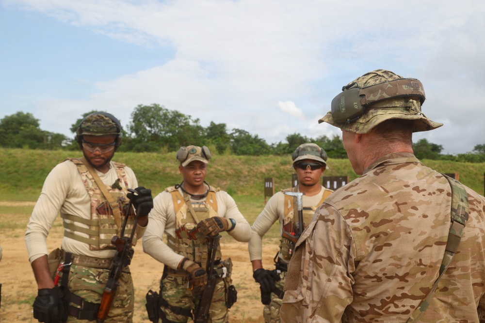 Multinational special operations forces execute rifle and pistol marksmanship drills during Flintlock 26