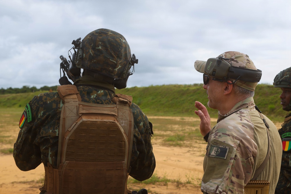Multinational special operations forces execute rifle and pistol marksmanship drills during Flintlock 26