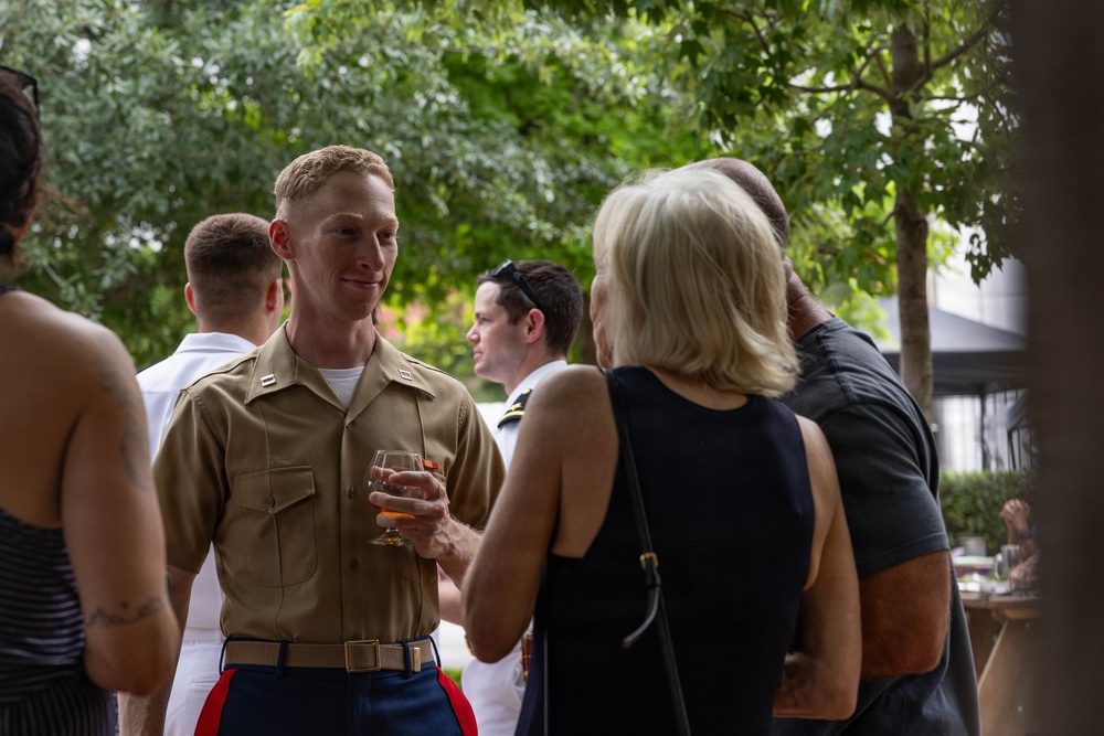 U.S. Marines with MWSS-272 attend an officer social event