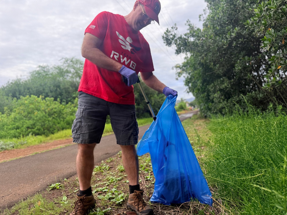 Laulima Navy volunteers unite to clean the Pearl Harbor Bike Path in Aiea.